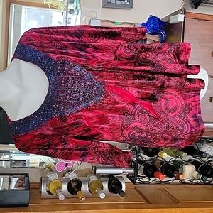 energe world wear. Velvet; poly/spandex blend. Red print. Stretch. 1x
